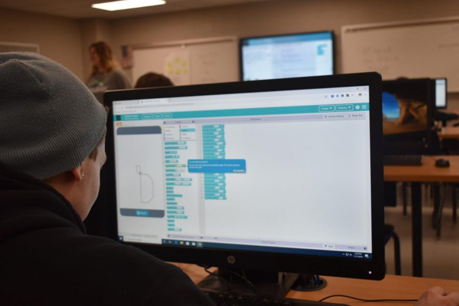 Senior Zach Mann practices coding in his computer science course.  Many students will use these skills in the work force. 