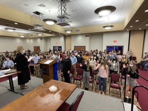 Judge Mary Jane Phelps swears in the new teen court members in November of 2021.  