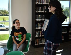 Seniors Aaliyah Johnson and Livvy Lambros discuss their most recent read in a Book Bites meeting.  