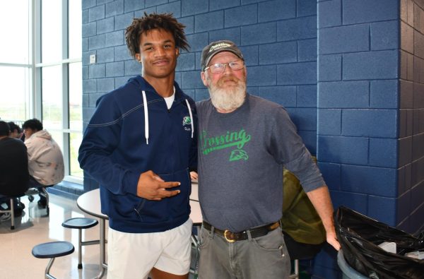 Head custodian Les Taulbee can usually be found greeting students during lunch blocks.  Maintaining the cleanliness of the cafeteria during breakfast and lunch is a daily tasks for custodial staff.  