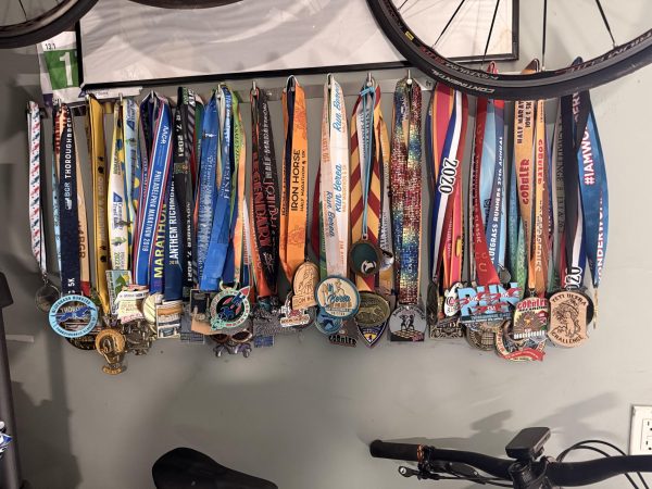 Manlief's collection of race medals will grow larger in 2026 as she plans to run a marathon in honor of her 50th birthday.  