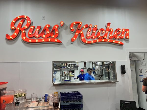 Chef Amanda Thomas prepares for the evening meal in Russ' Kitchen. Dinner is served four nights a week.